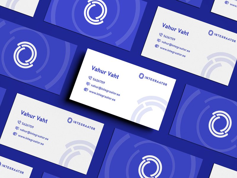 Integraator blue business cards with a circular logo
